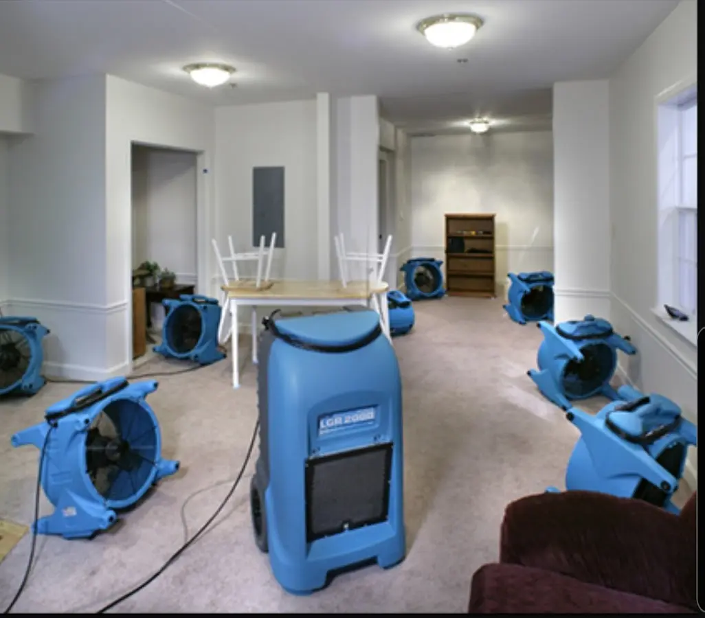 Air movers and dehumidifier setup for Water Damage Restoration in Delta